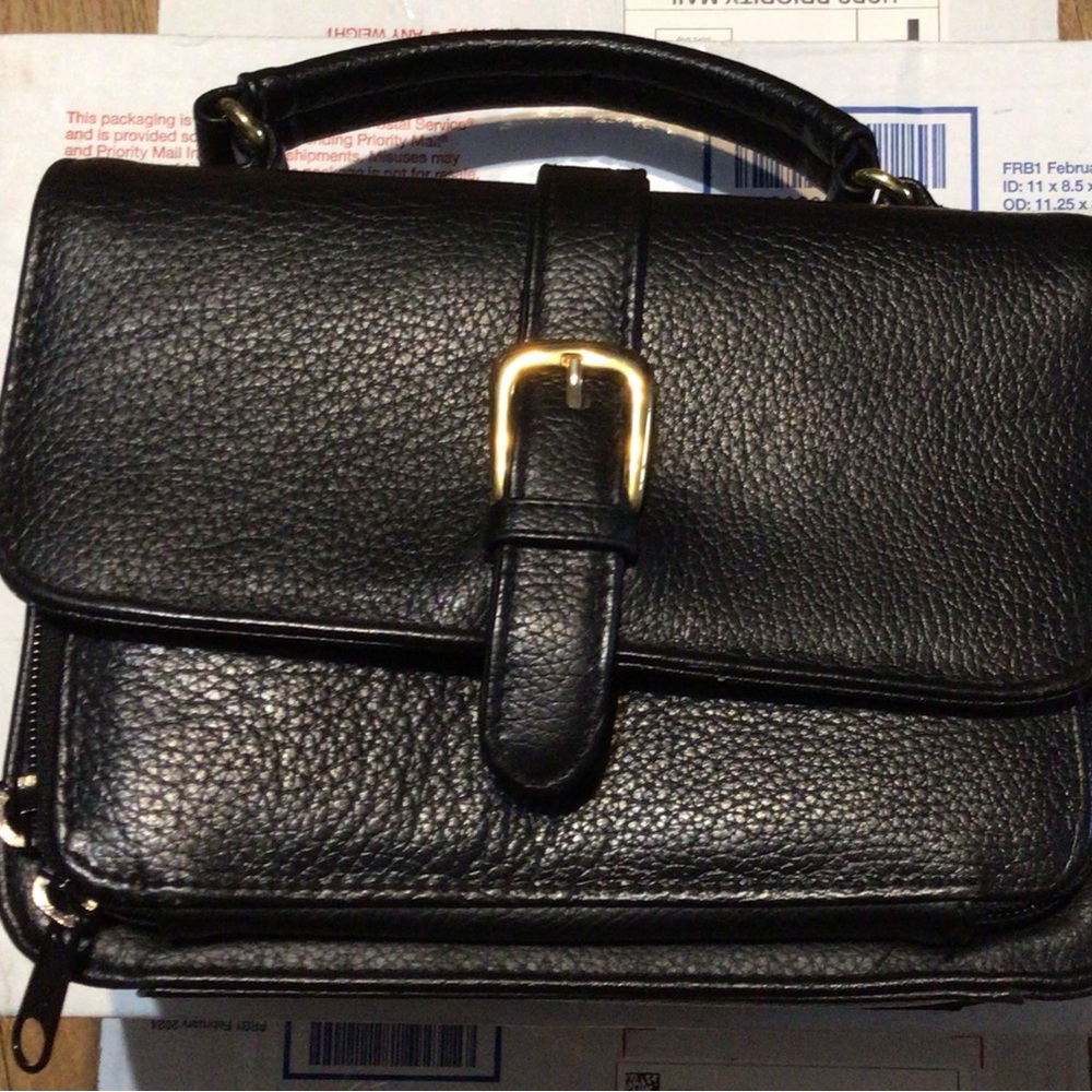 Chic Black Bag with Gold Buckle, also has strap for crossbody.